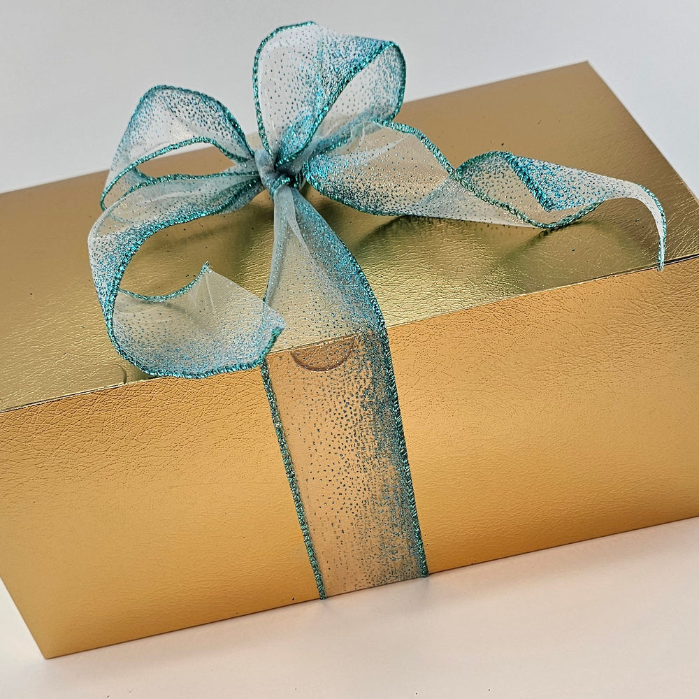 
                  
                    Golden Indulgence Gift Box – Organic Dark Chocolate Covered Nuts & Fruits
                  
                